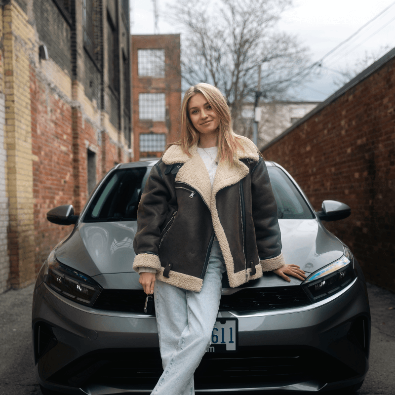 Team member with a Roam vehicle