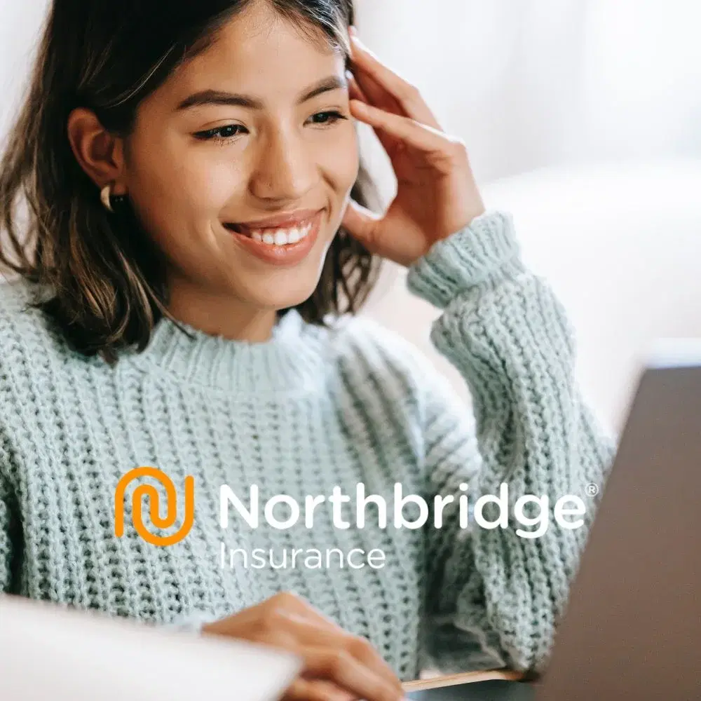 A person using a laptop with Northbridge Insurance branding on the image.